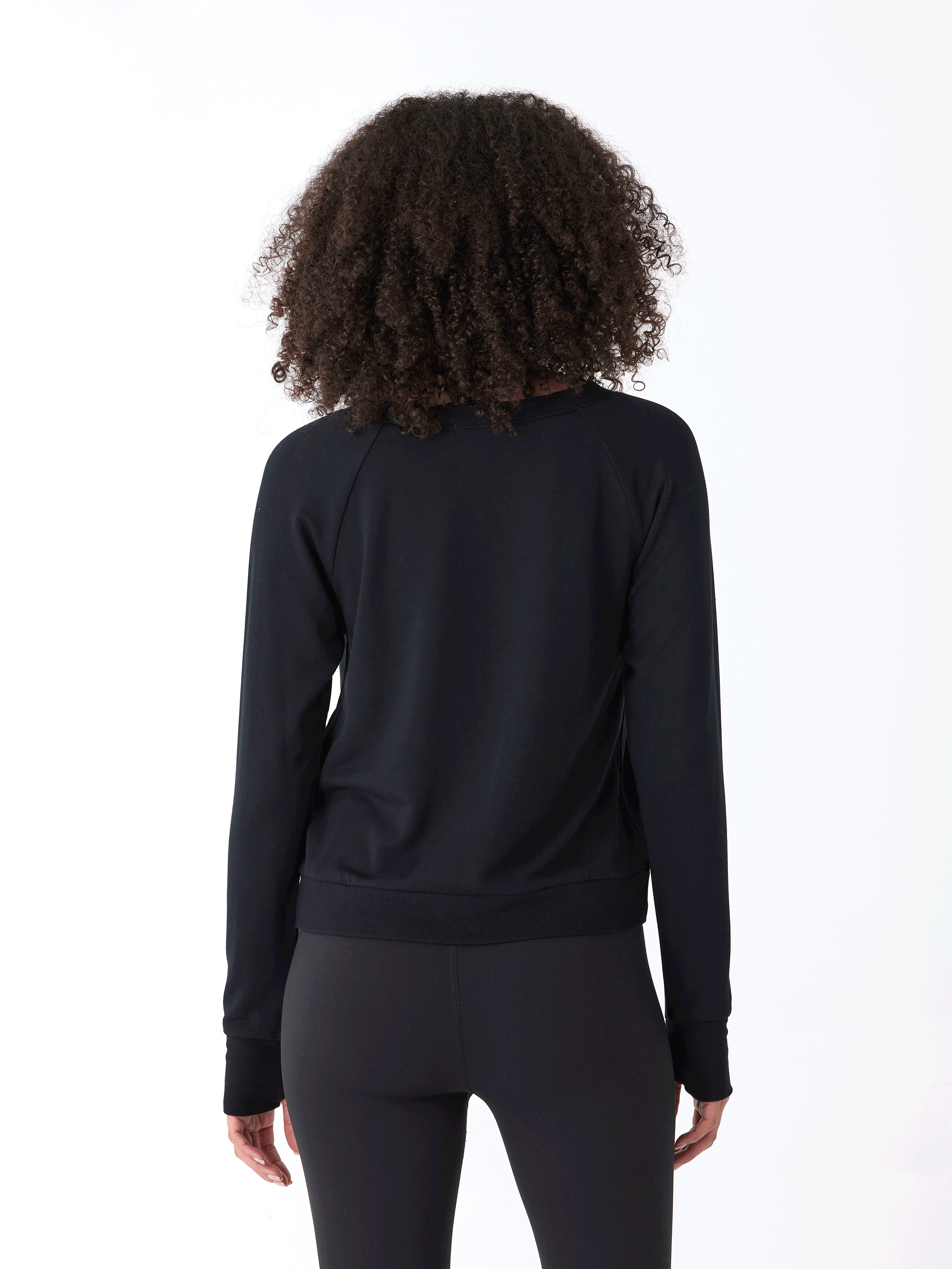 Halle Feather Fleece Crossover Hem Top in Black