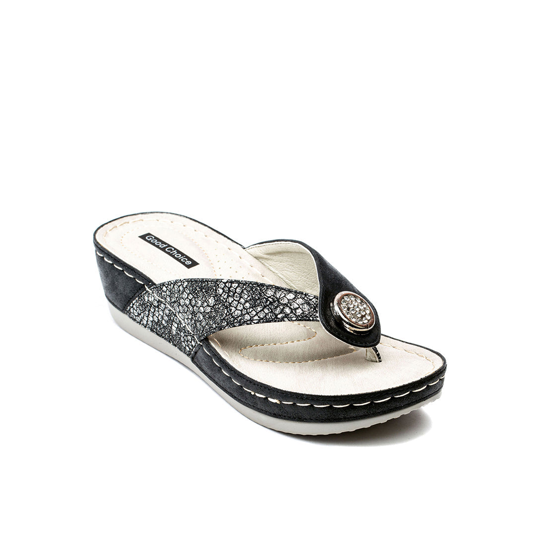 Dafni black wedge sandals with a sleek, minimalist silhouette.