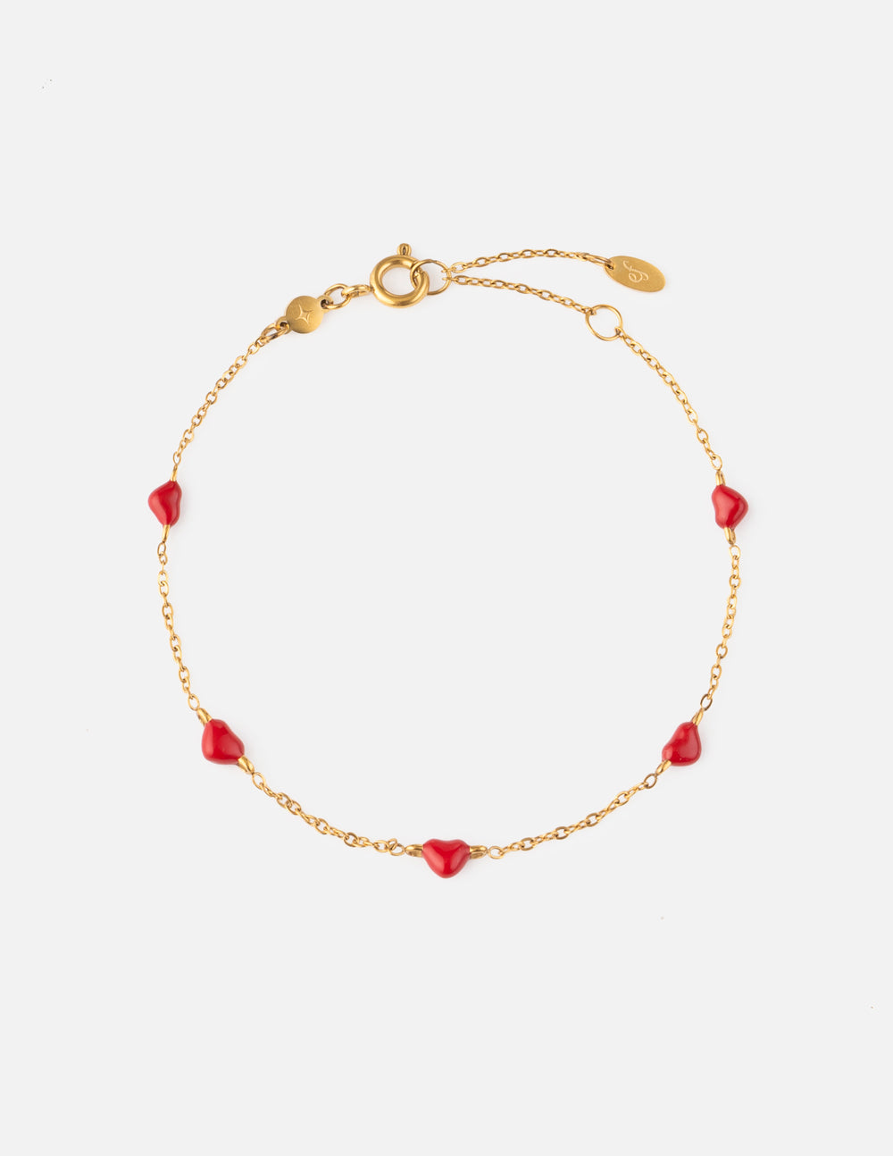 Minimalist dainty love link chain bracelet worn on a woman's wrist