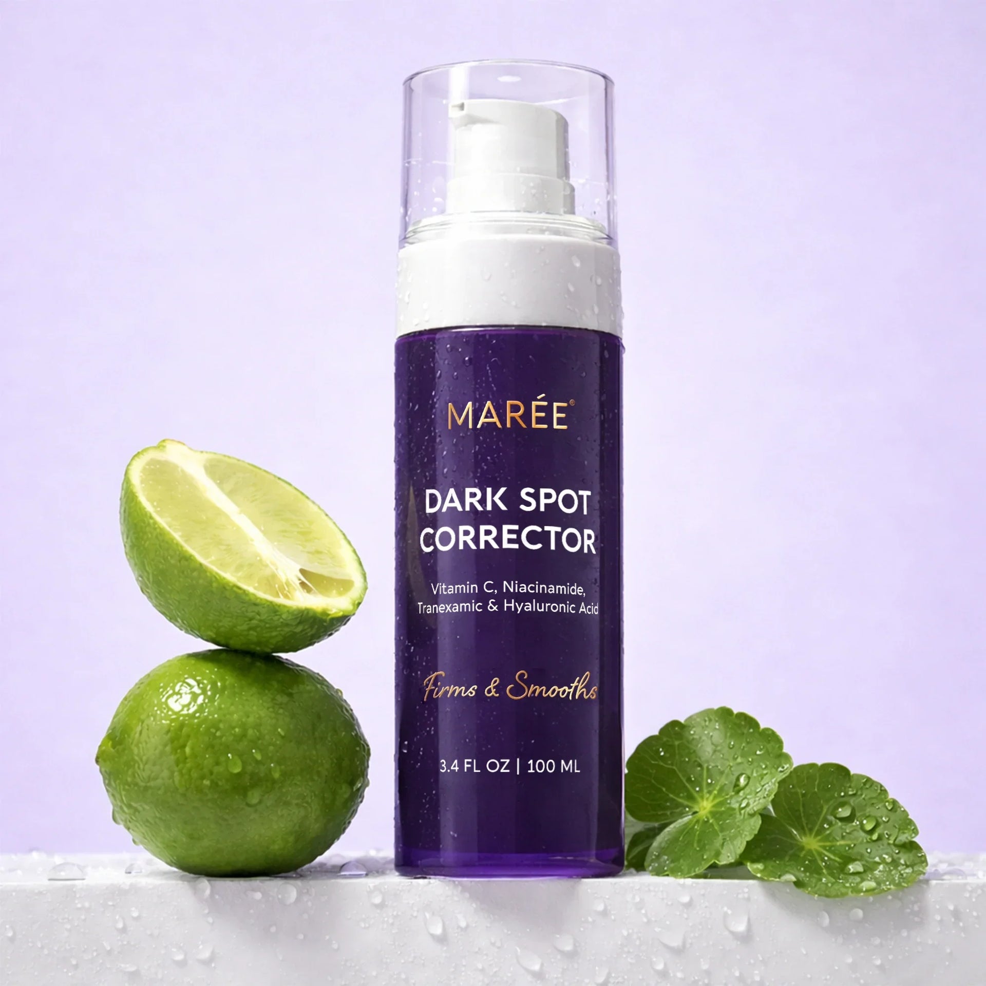 Maree Dark Spot Corrector bottle featuring Vitamin C, Niacinamide, and Hyaluronic Acid on a lavender background with fresh limes.