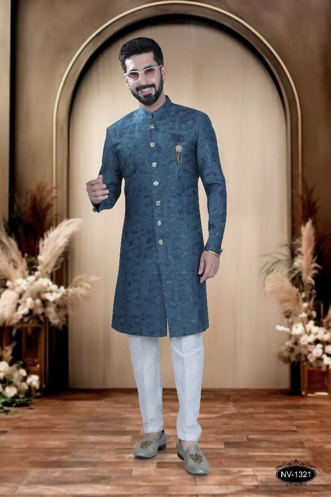 Men's Blue TR Kurta with white polo pyjama, showing self-design fabric detail.