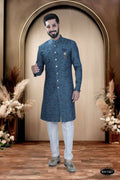 Men's Blue TR Kurta with white polo pyjama, showing self-design fabric detail.