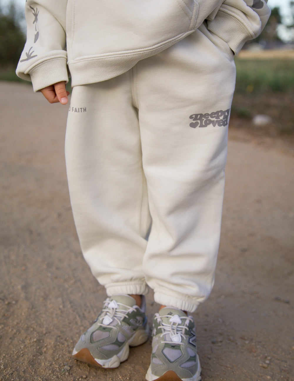 Kids minimalist cotton sweatpants in cream and grey colors