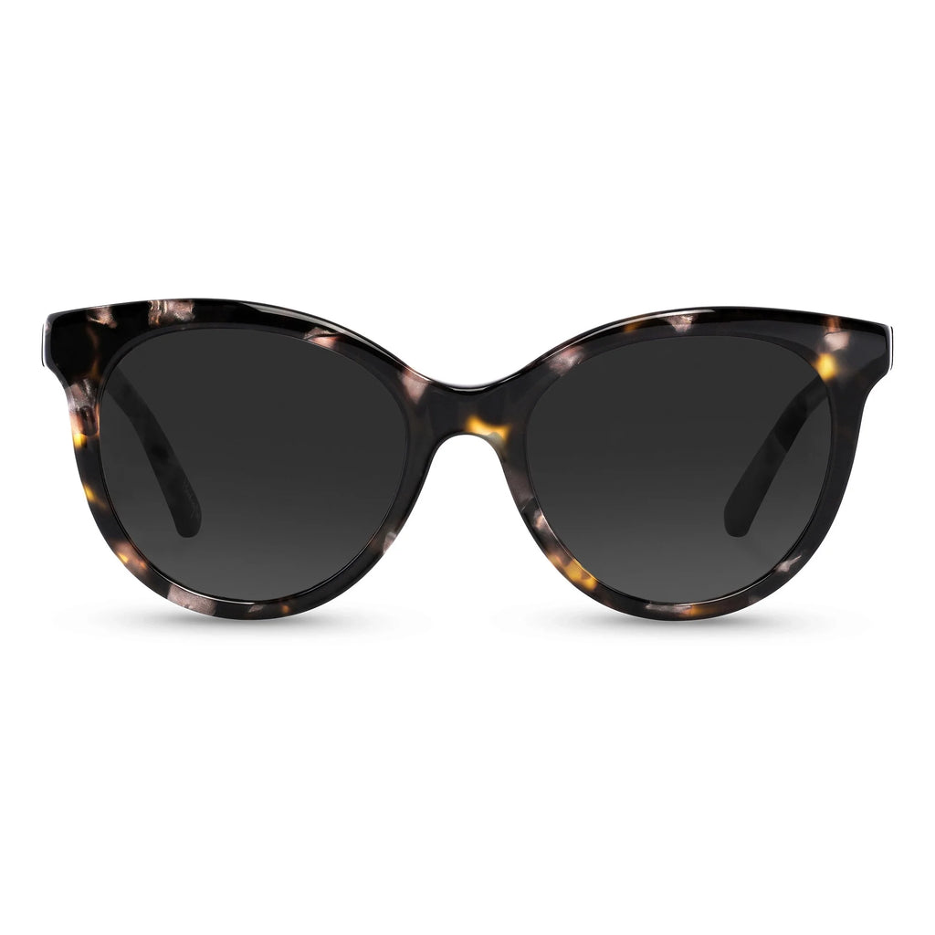 The Demi cat-eye sunglasses featuring a Havana Pearl frame on a neutral background