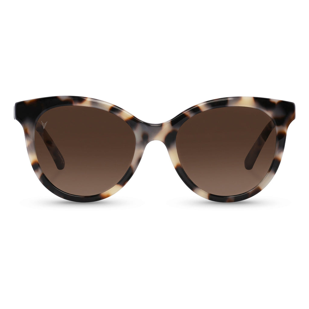 The Demi sunglasses in Ivory Tort with a classic cat-eye frame and polarized lenses