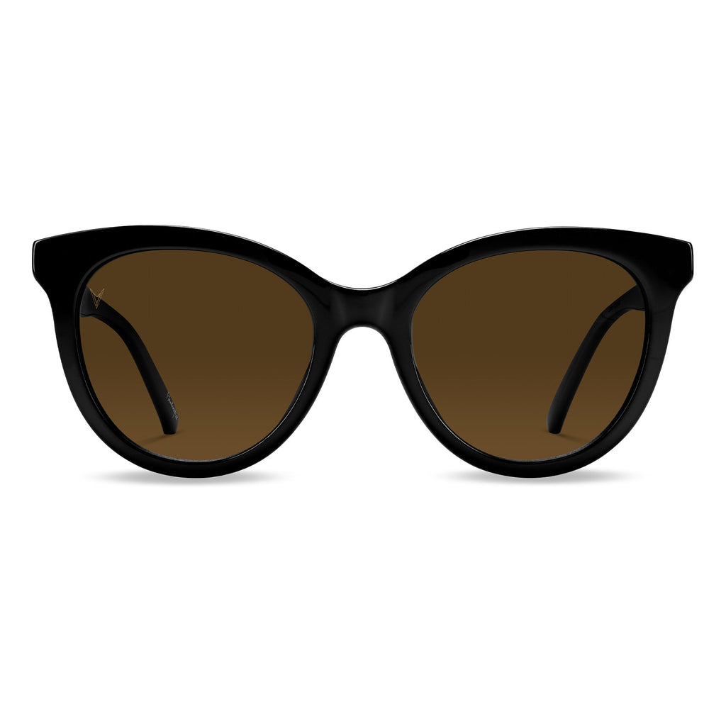 The Demi sunglasses in Jet Black featuring a bold, oversized cat-eye frame.