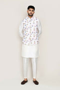 Man wearing a crisp white Art Silk kurta with a matching jacket and straight-fit trousers