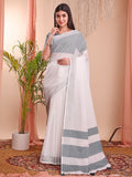 Elegant white linen cotton saree with matching blouse piece