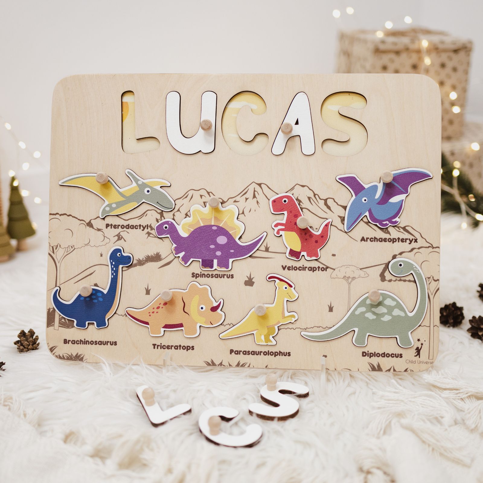 Personalized dinosaur-themed wooden name puzzle board for toddlers and children