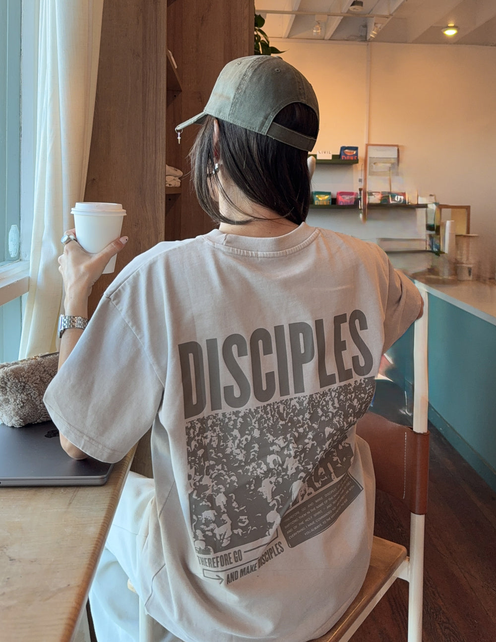 Model wearing a structured, boxy fit Disciples Heavyweight cotton tee in a premium heavyweight finish.