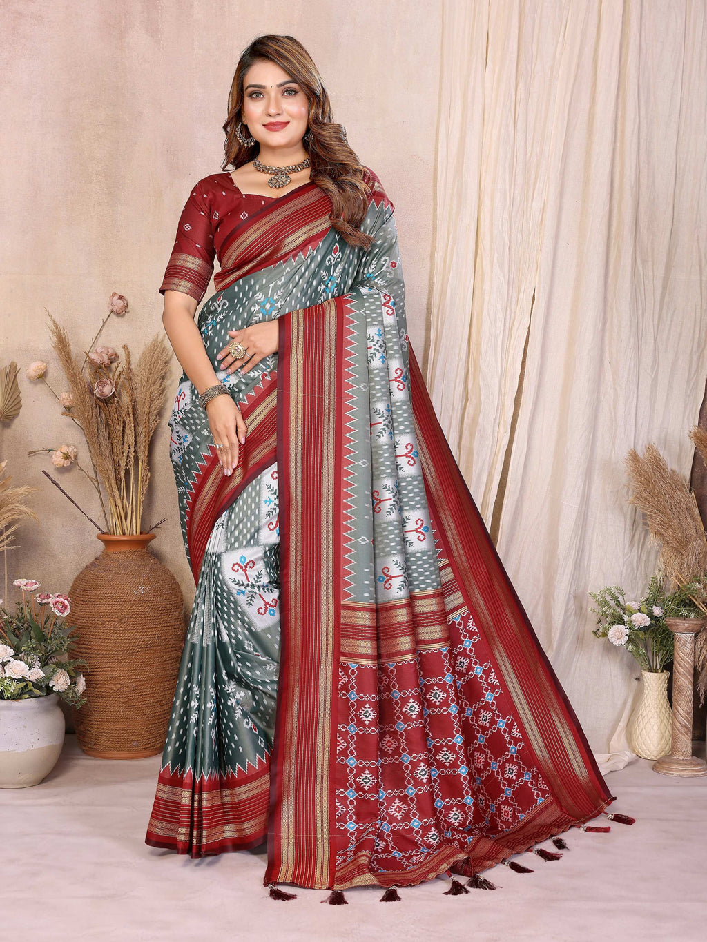 Sophisticated grey soft silk saree featuring elegant weaving.
