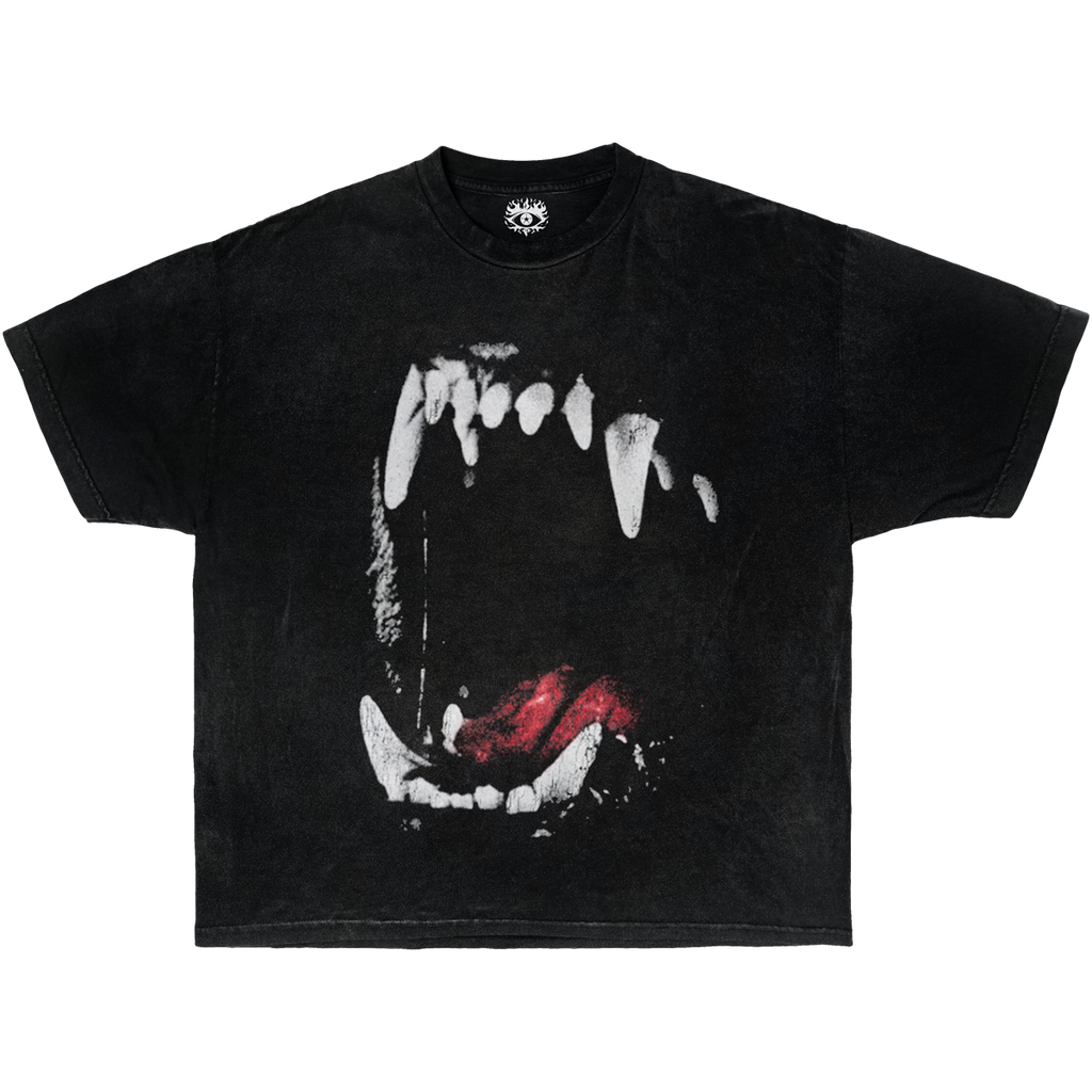 A black short-sleeve boxy streetwear t-shirt featuring a large graphic print of a dog's teeth on the chest, isolated on a white background.