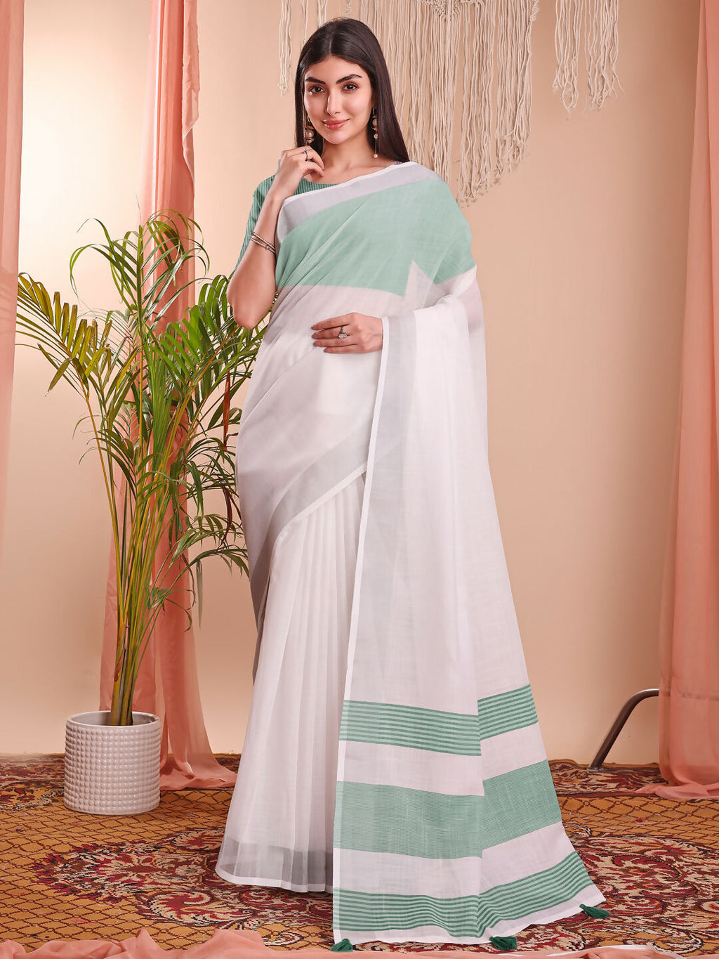 Elegant white linen cotton saree with matching blouse fabric