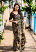 Coffee colored cotton blend Ajrak saree with zari woven border and unstitched blouse