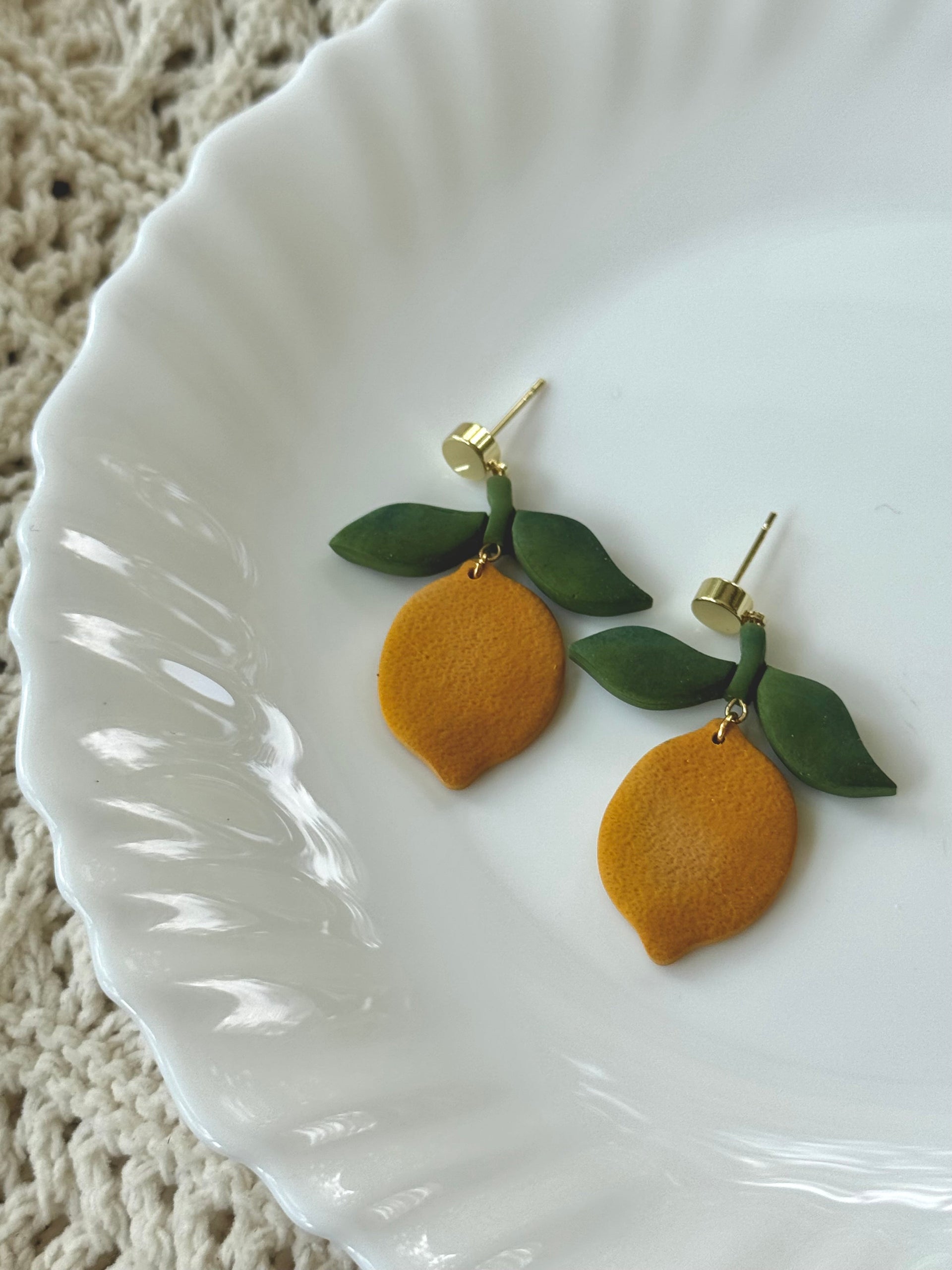 Lemon Drops handmade polymer clay earrings in bright yellow and green.