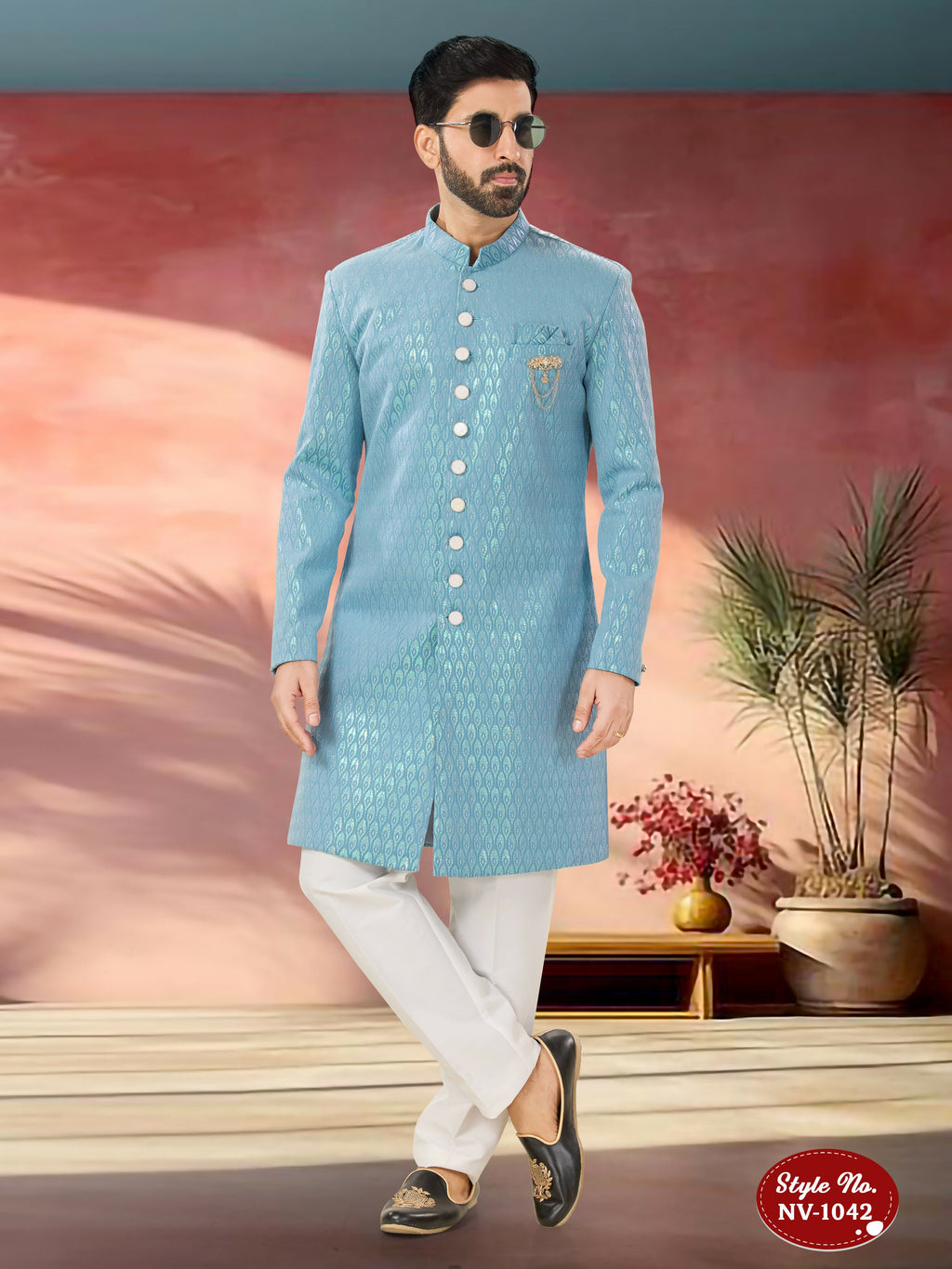 Men's blue Indo-Western kurta set with detailed thread and sequence embroidery in imported Armani fabric.