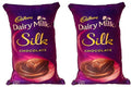 Set of 2 reversible silk-feel microfibre cushions for kids rooms