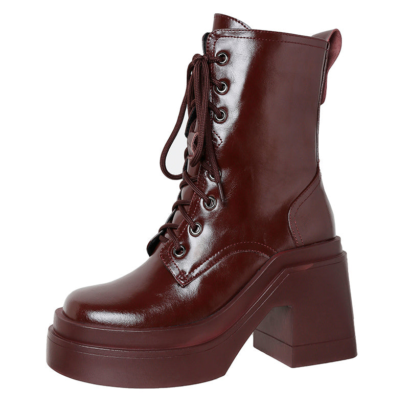 Shiny black and glossy burgundy chunky platform lace-up boots for women with thick soles and block heels, presented on a white background.