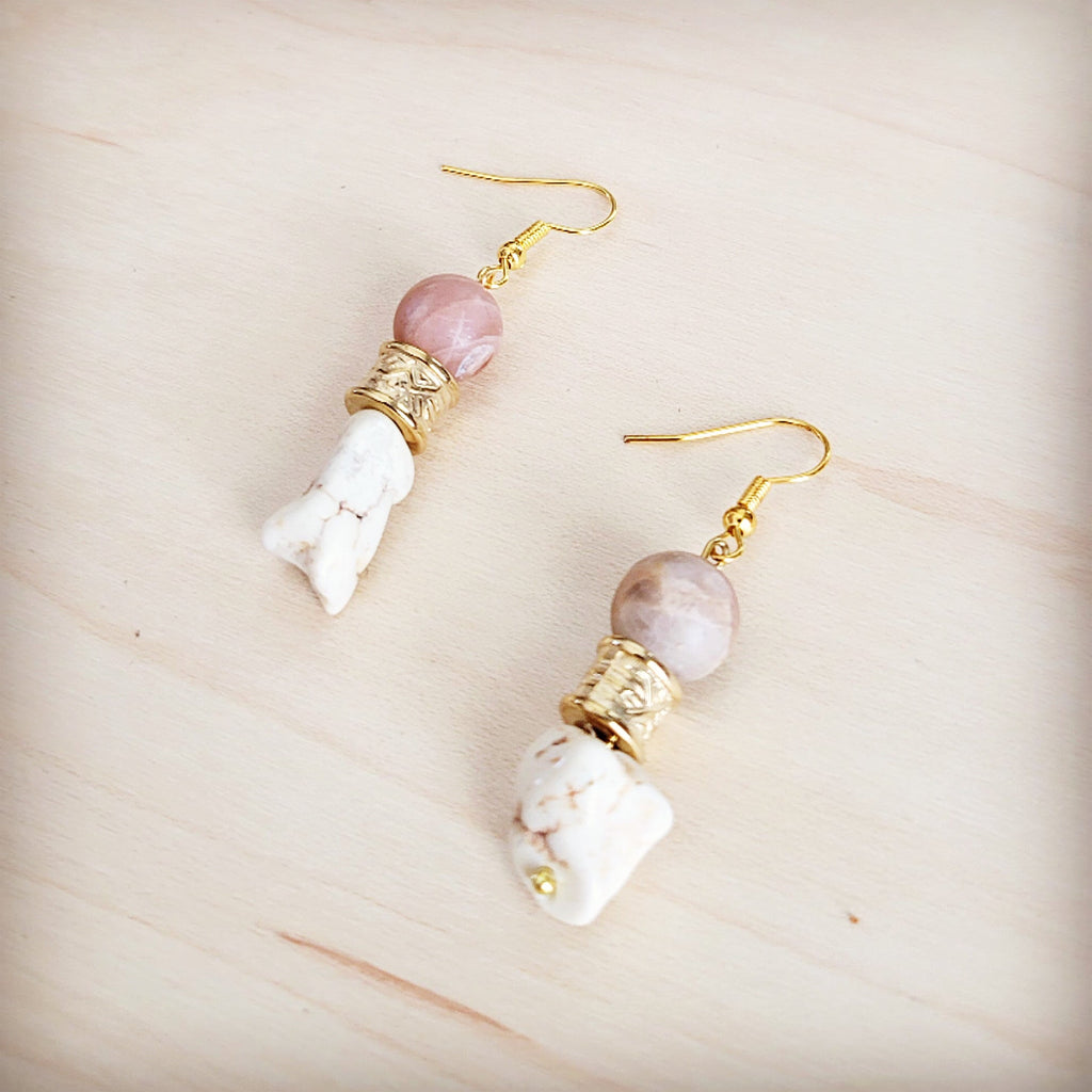 A pair of gold-tone drop earrings featuring frosted sunstone beads and rough white turquoise stones.