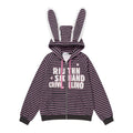 Front view of a women's black and pink striped full-zip hoodie with white lace-trimmed bunny ears on the hood and graphic text on the chest.
