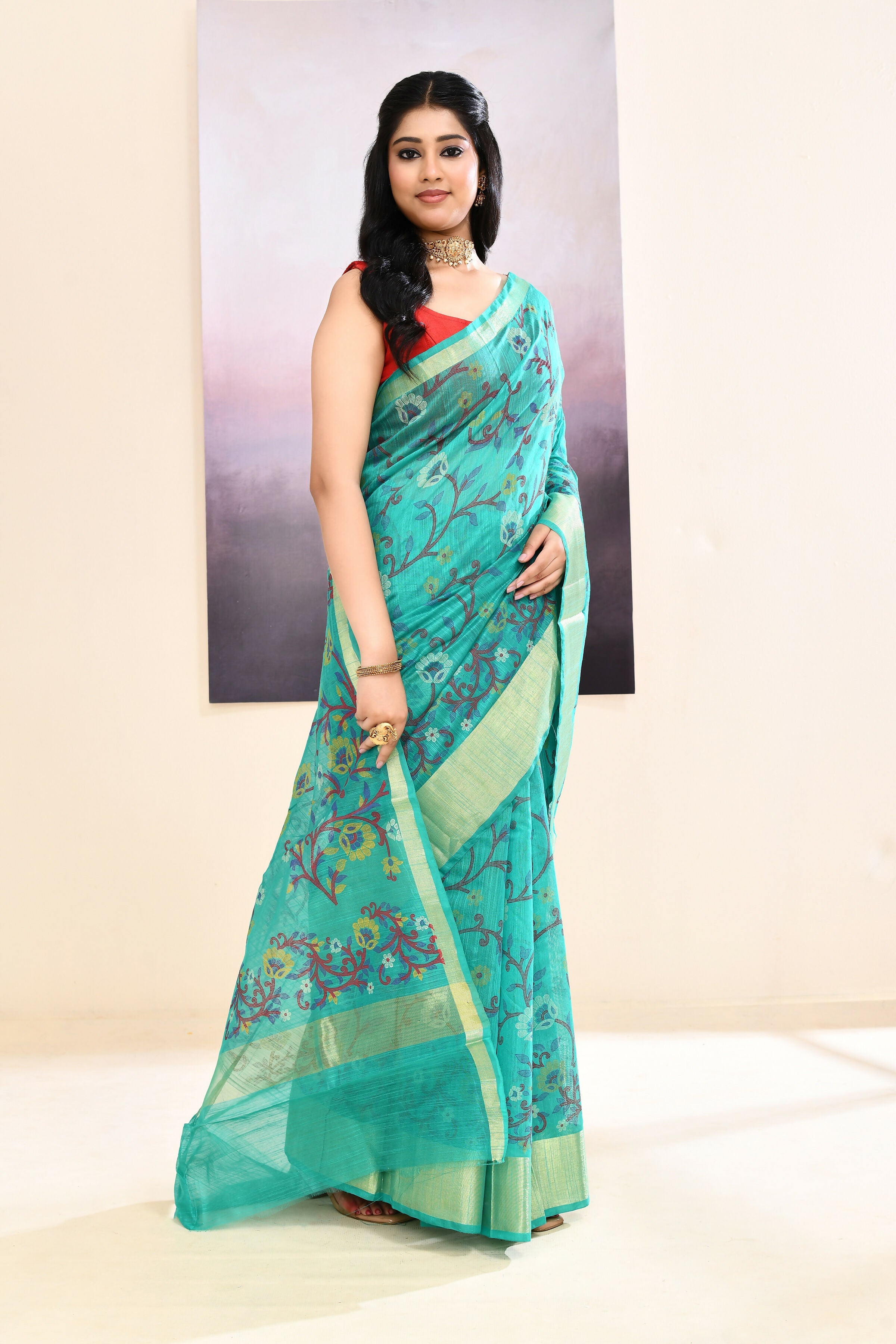 Turquoise Embellished Cotton Blend Printed Saree