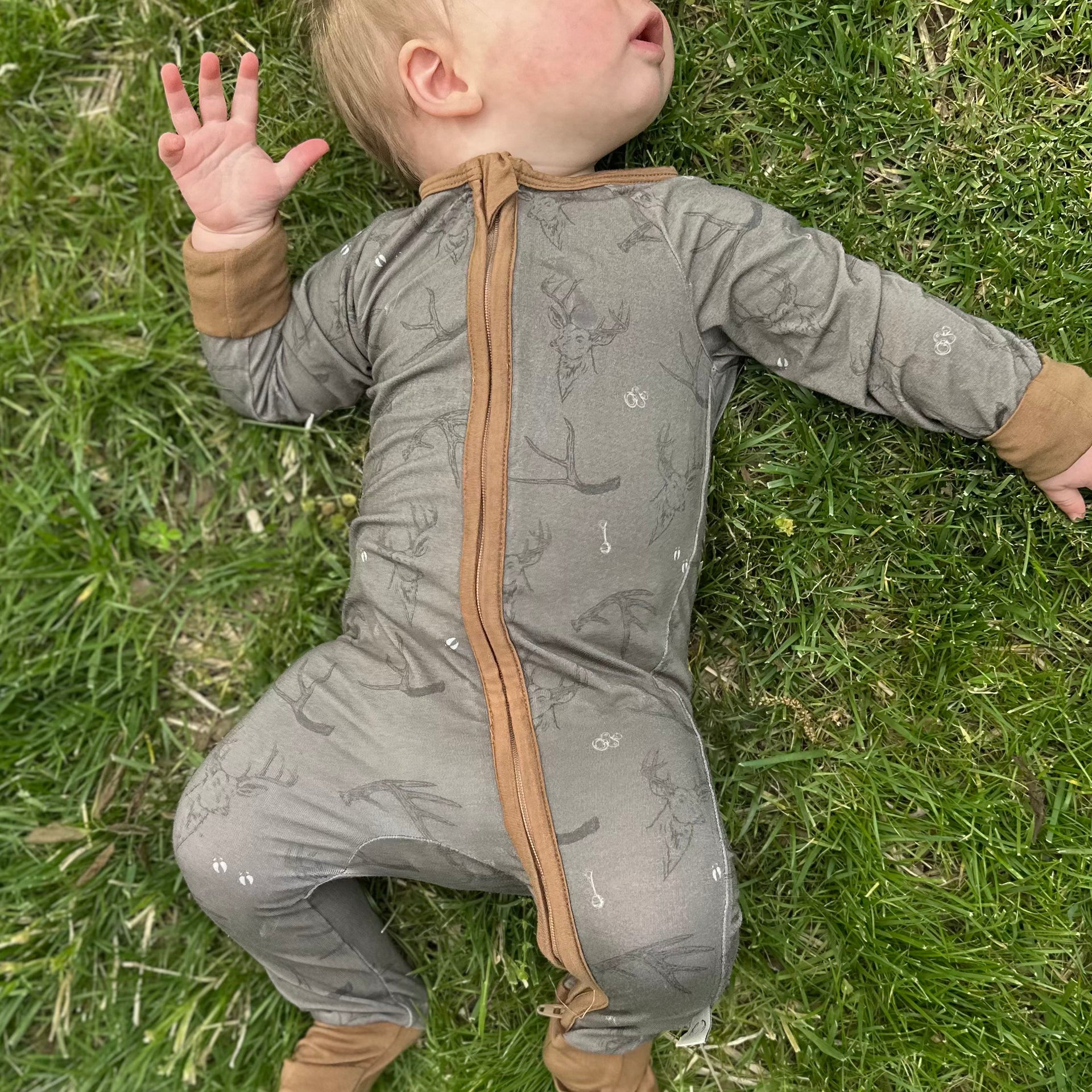 Minimalist taupe and brown bamboo baby zippy sleeper with double zipper and fold-over cuffs.