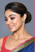 Traditional Golden White Kundan and Ruby stone earrings.