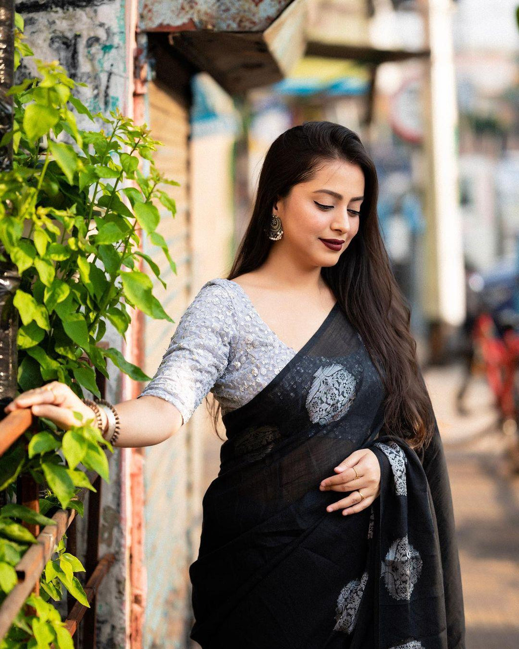 Black pure linen saree with gold zari jacquard and heavy embroidered blouse