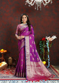 Elegant Purple Soft Silk saree featuring Zari weaving and matching blouse