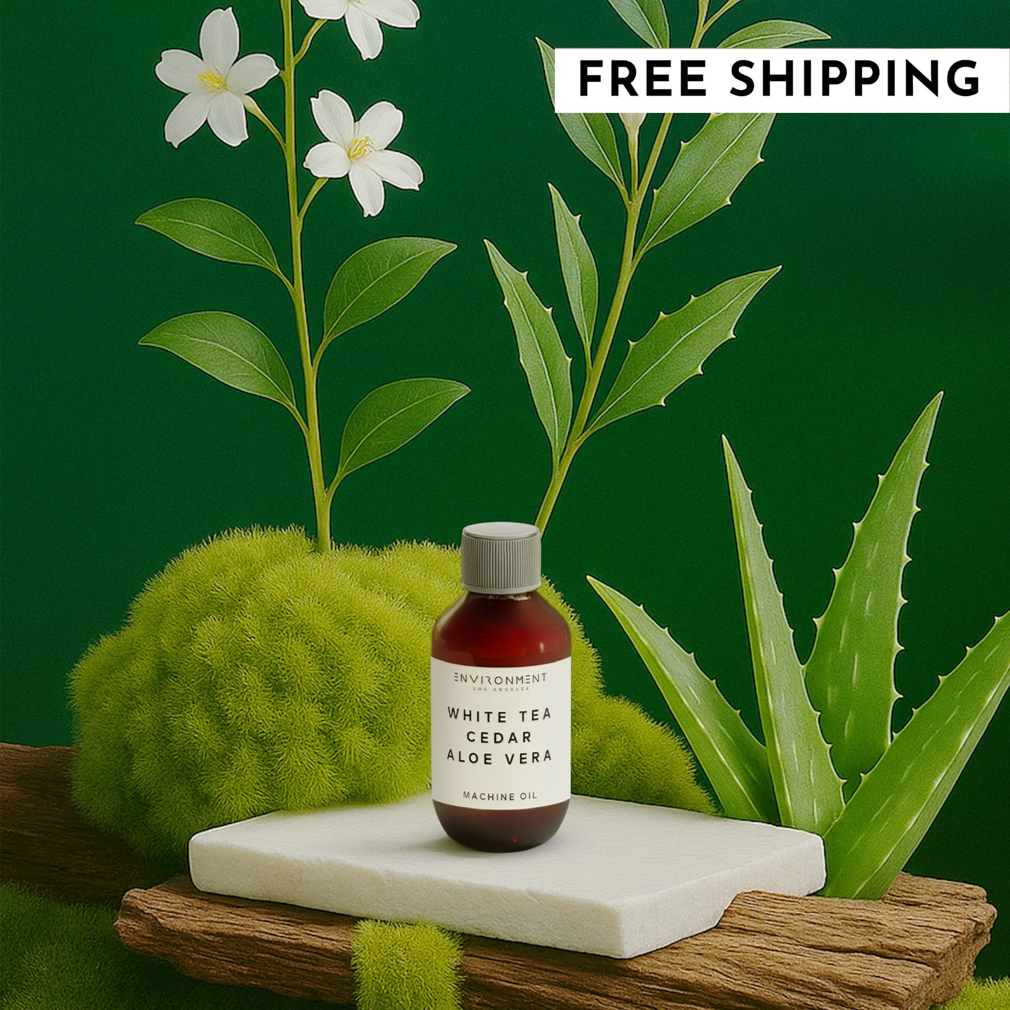 A 2oz bottle of White Tea, Cedar, and Aloe Vera machine diffusing oil displayed on a rustic wood block surrounded by natural elements.