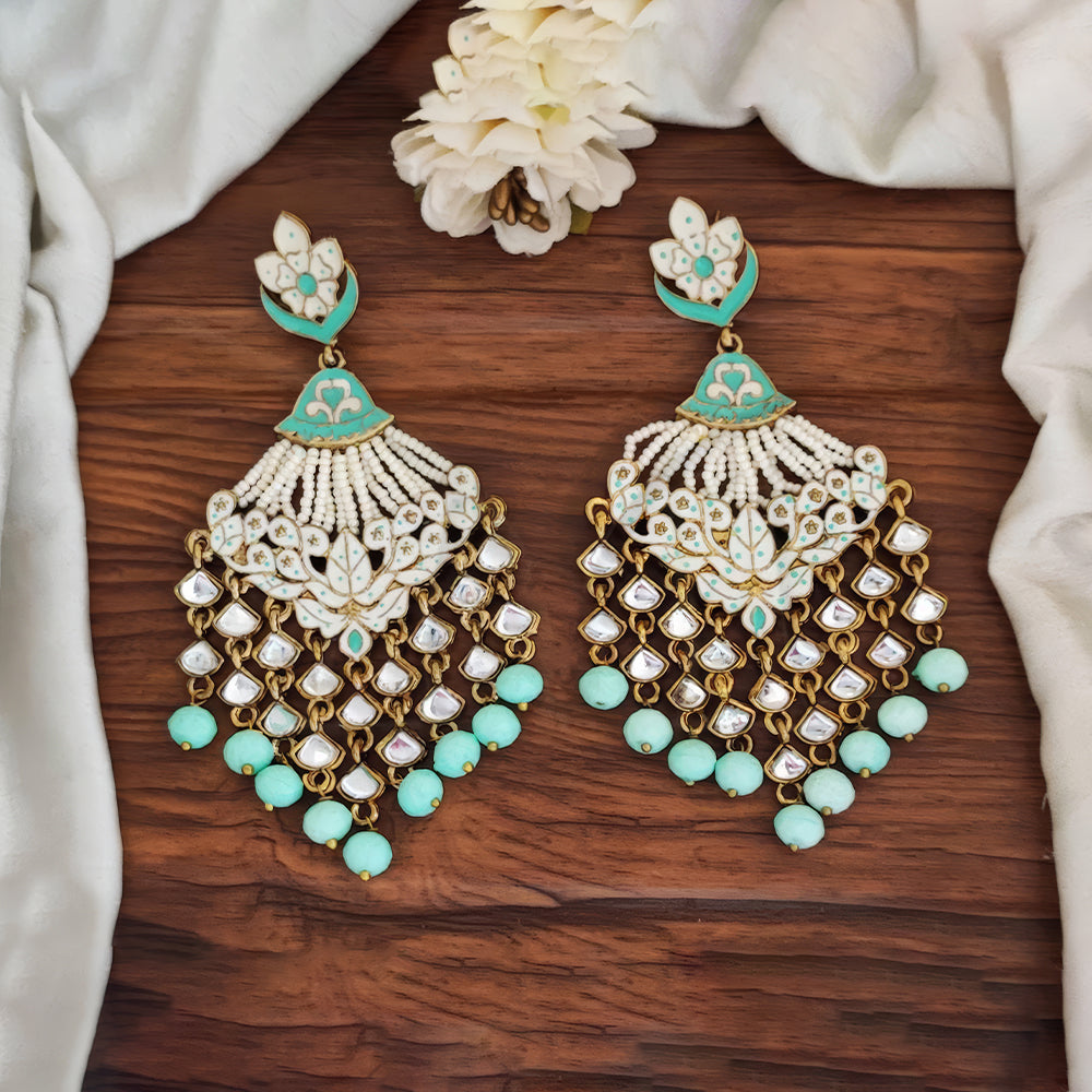 Long floral Meenakari earrings in mint-green and gold with clustered pearl drops for wedding wear.