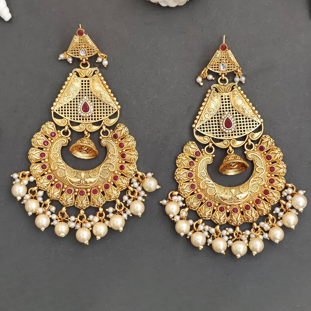 Long Rajwadi antique style earrings in gold, red, and white for ethnic bridal wear.