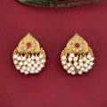 Side-view shot of an antique design gold plated earring for women