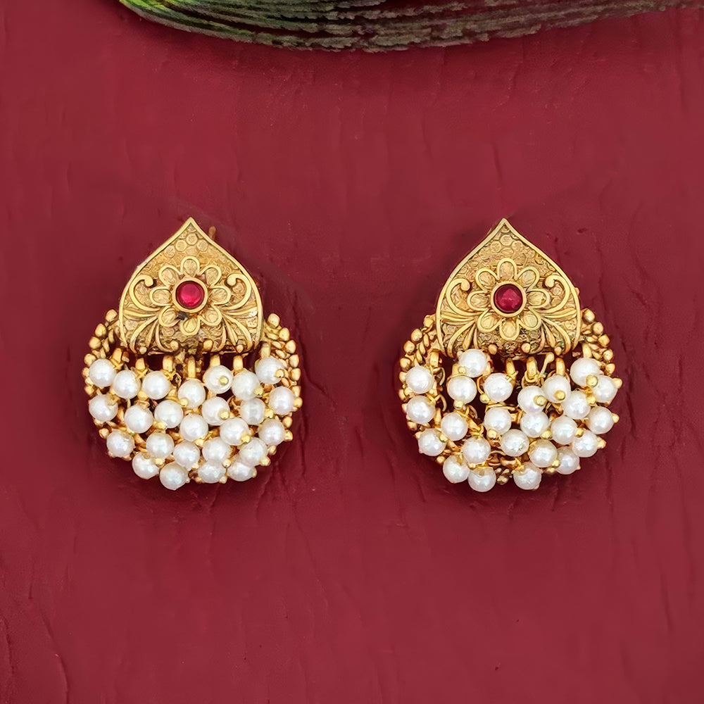 Side-view shot of an antique design gold plated earring for women