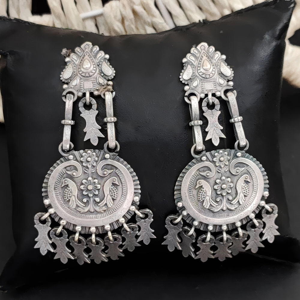 Stone-studded oxidized silver designer earrings for festive occasions