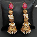 Close-up view of antique high gold polish traditional earrings for women