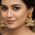 Ornate Temple Design Jhumka Earrings with Rajwadi Polish