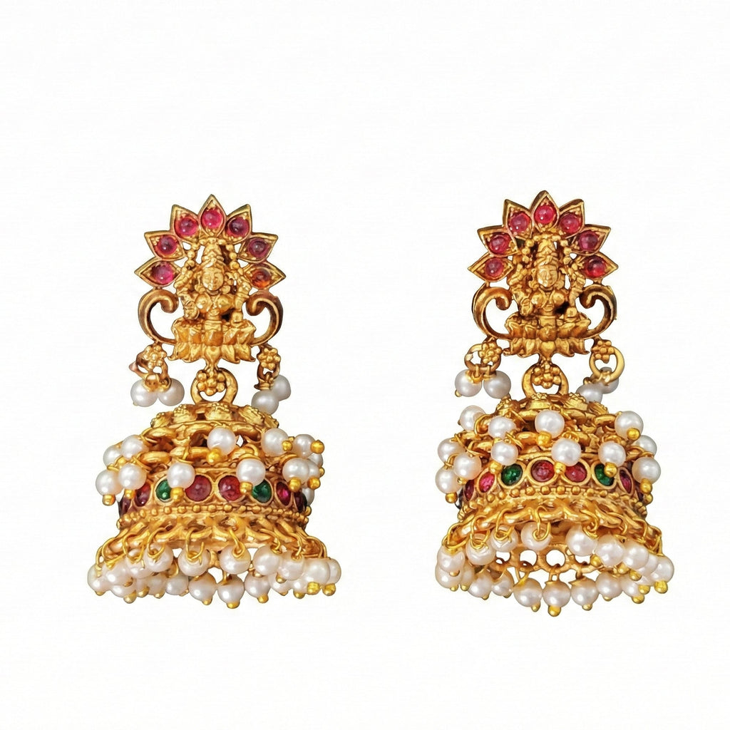 Ornate temple design Jhumka earrings with stone embellishments and antique Rajwadi polish