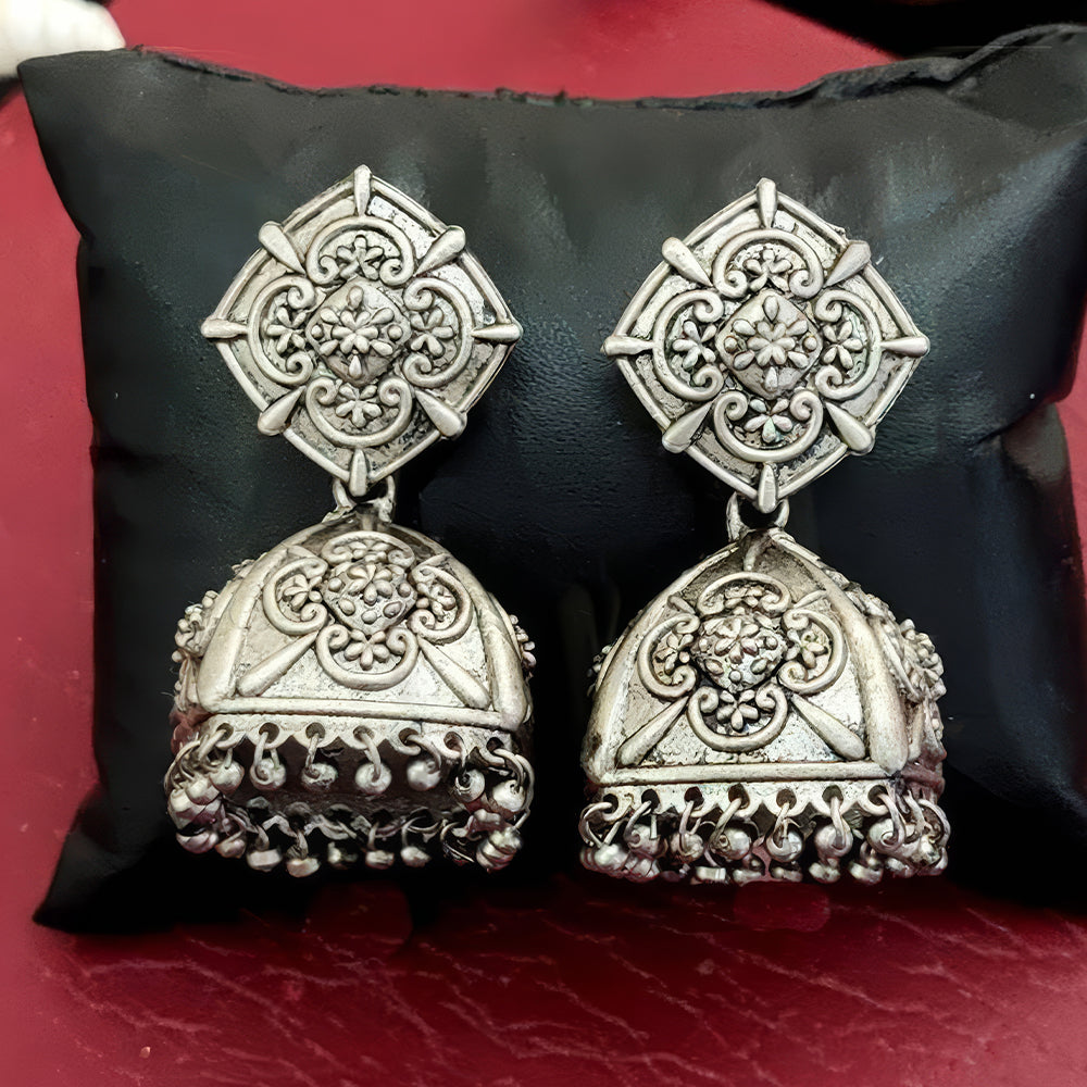 Beautiful oxidized silver-plated jhumka earrings with intricate ethnic designs for girls.