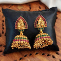 Shiv Parvati temple jhumka earrings in high gold polish with clustered pearls