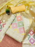 Yellow unstitched Zari Woven Organza suit fabric with intricate jacquard details