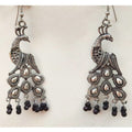 German silver oxidized peacock earrings with elegant black pearl drop details.