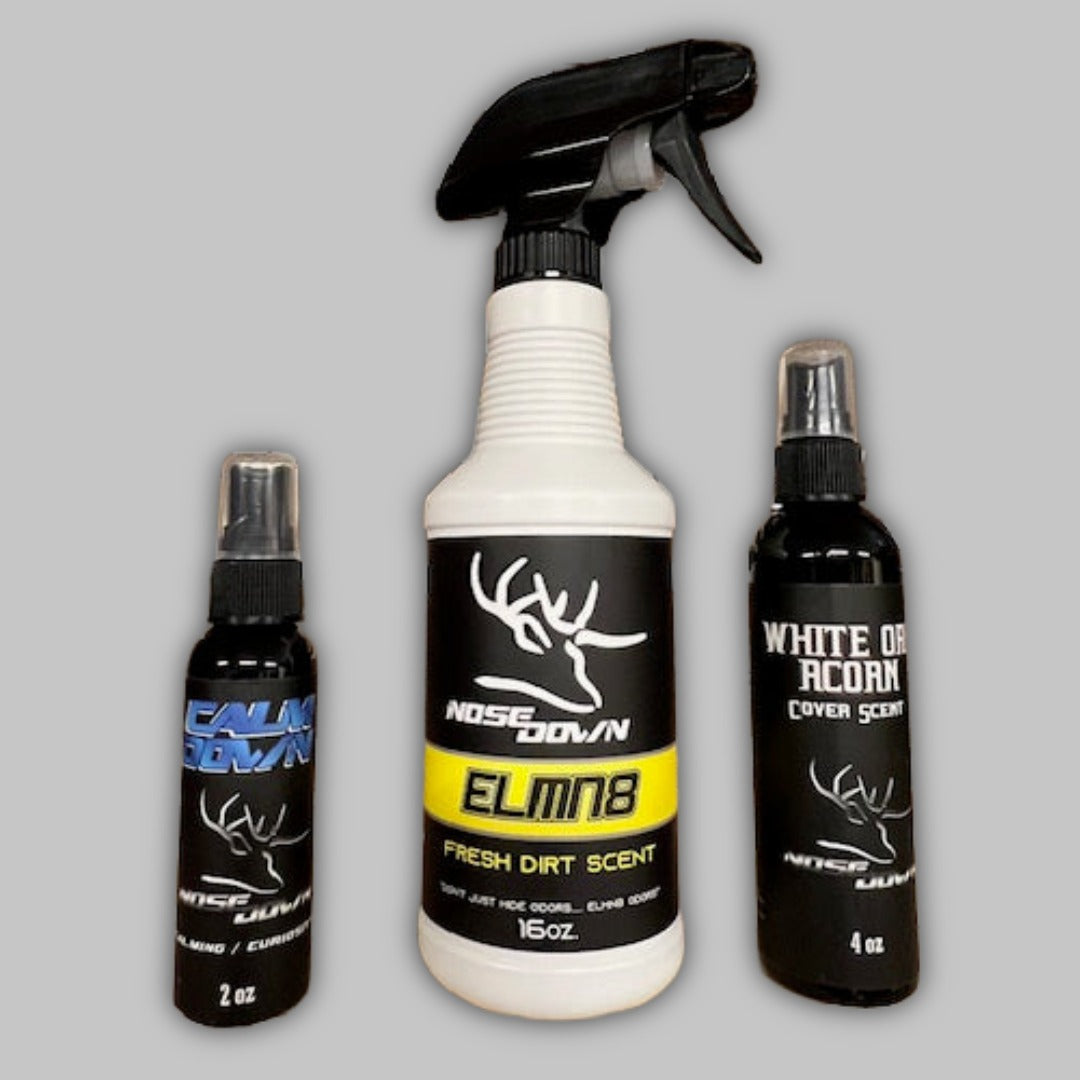 Early Season Combo hunting kit featuring 16oz ELMN8 spray, 2oz Calm Down spray, and 4oz White Oak Acorn scent in black and white bottles.