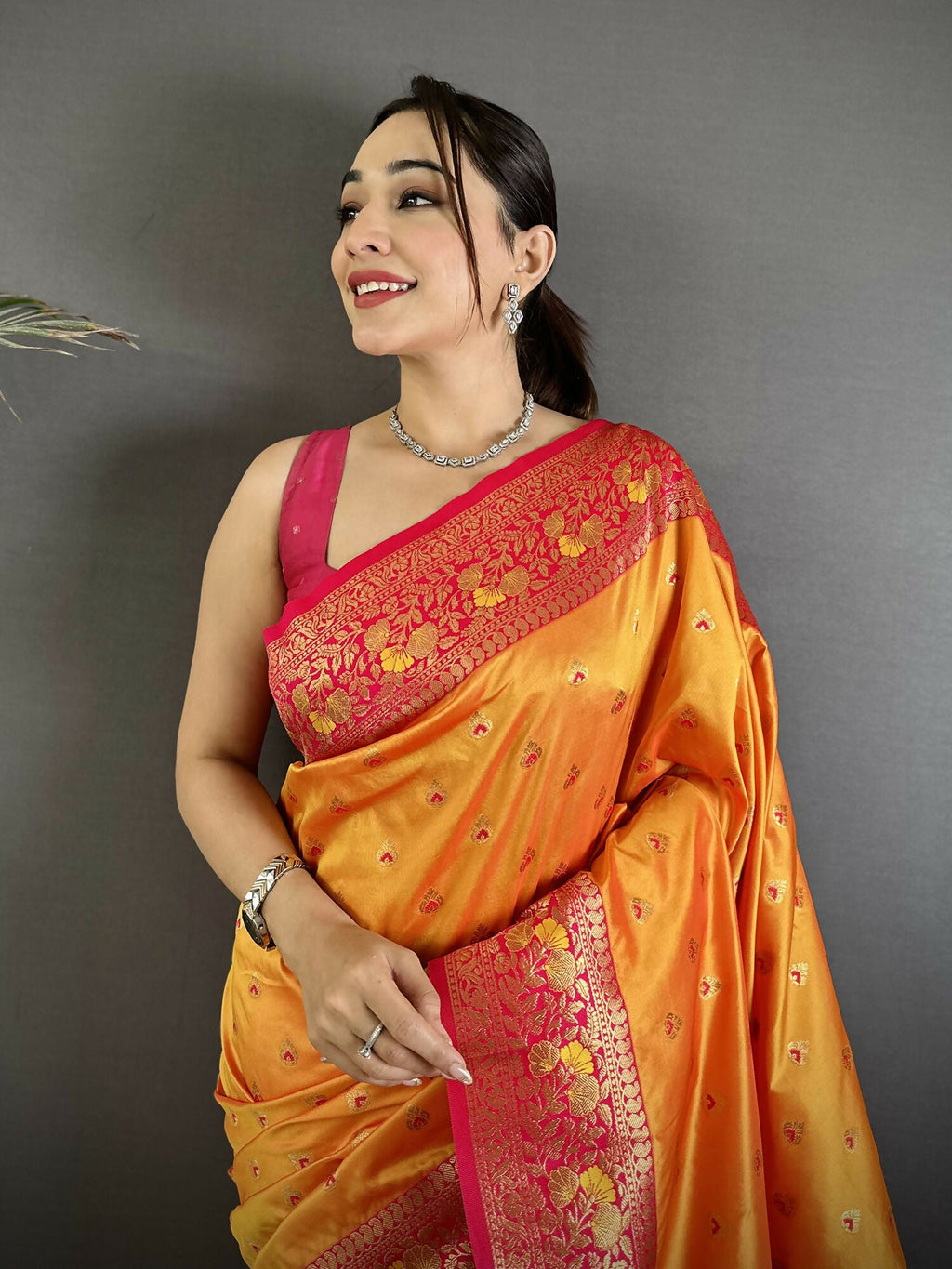 Orange Soft Silk Banarasi Saree with Intricate Motifs