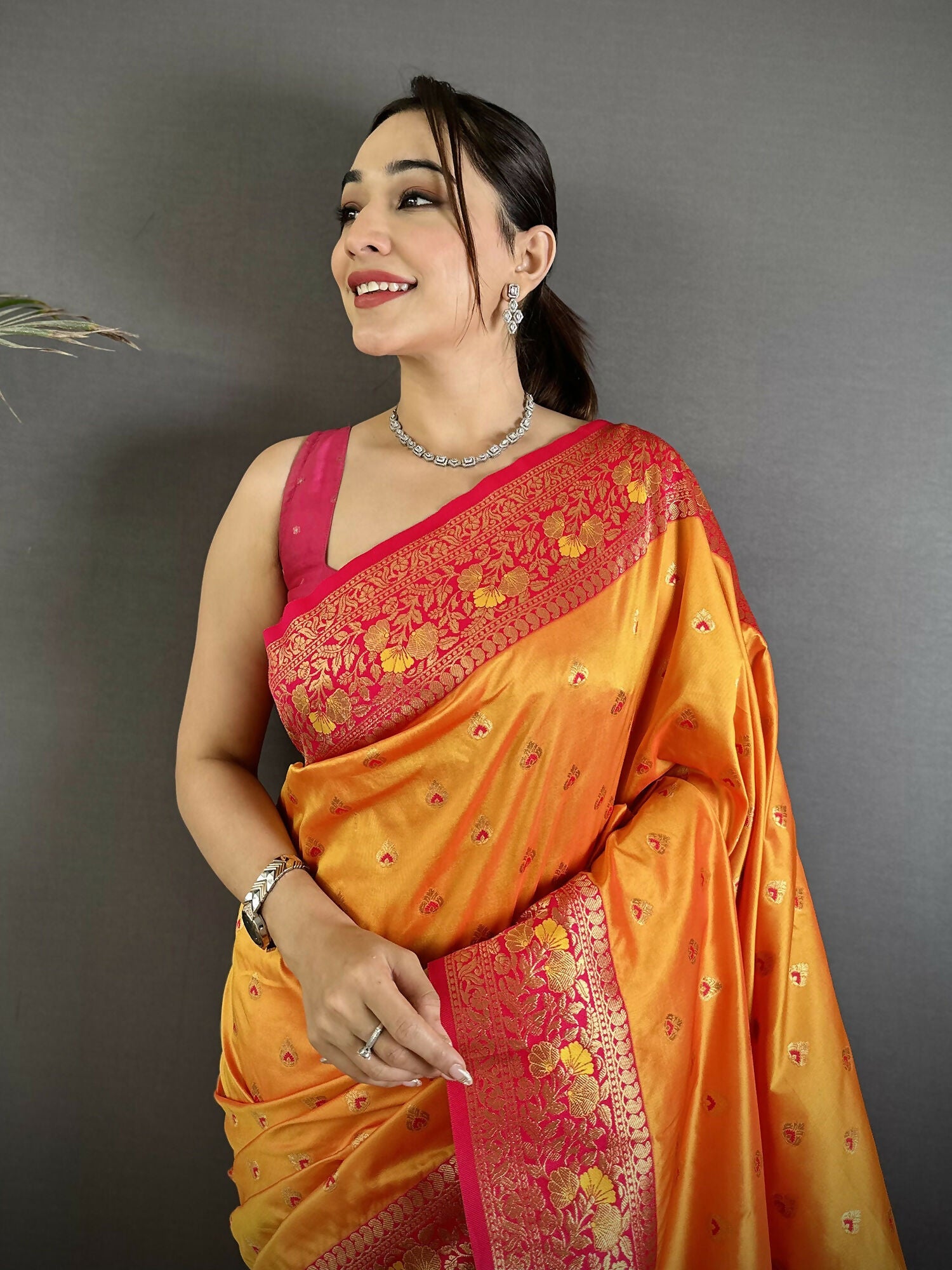 Orange Soft Silk Banarasi Saree with Intricate Motifs