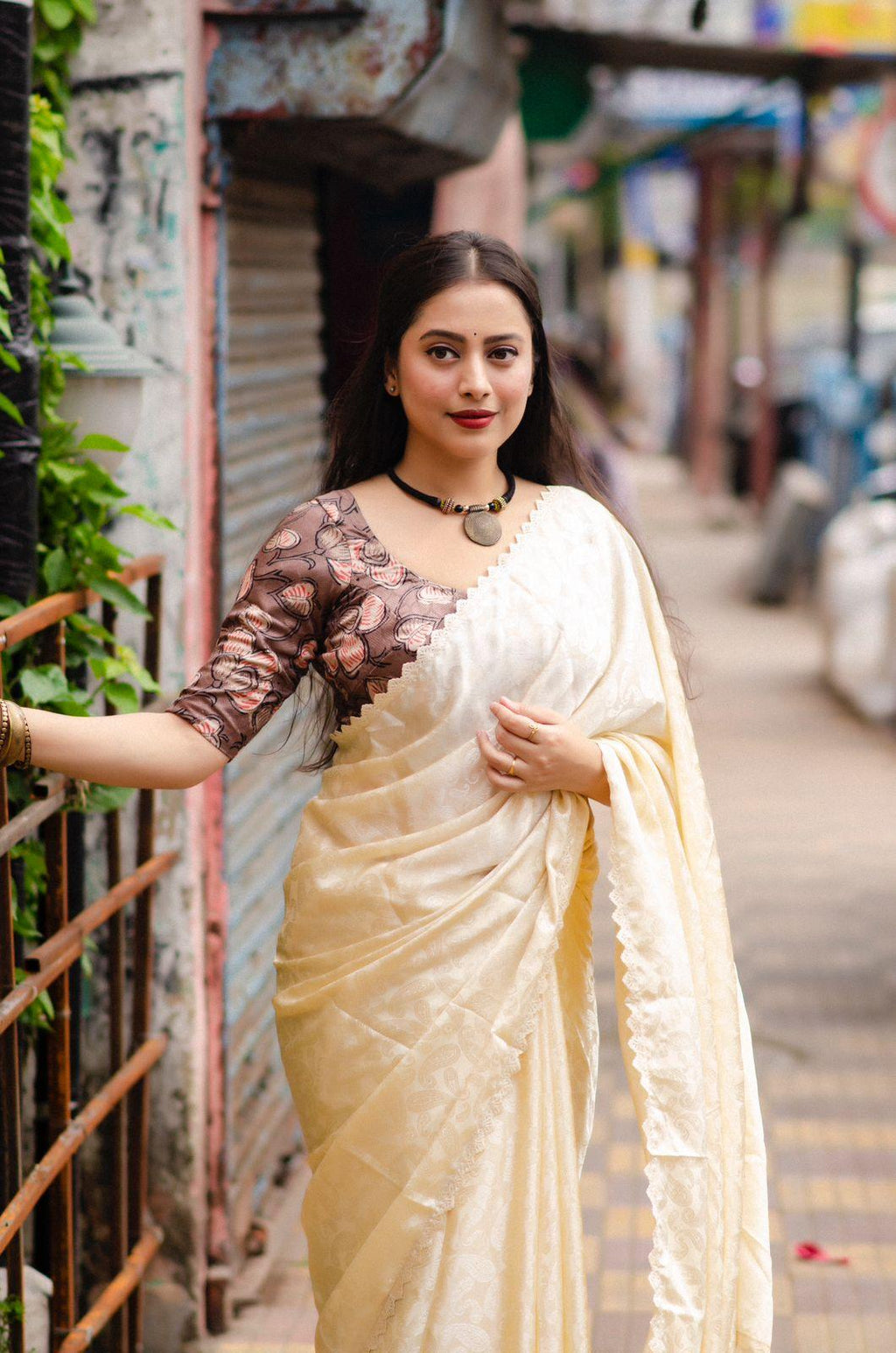 Cream Poly Silk Saree with Ethnic Mango Motifs and Cutwork Border