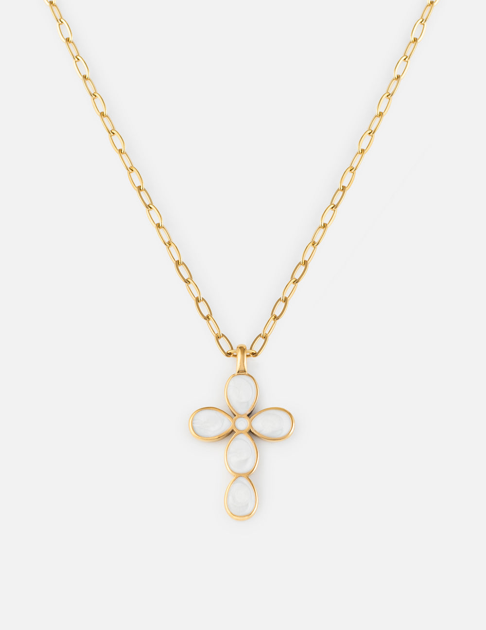Elegant gold-tone paperclip chain necklace featuring a delicate cross pendant against a neutral background.