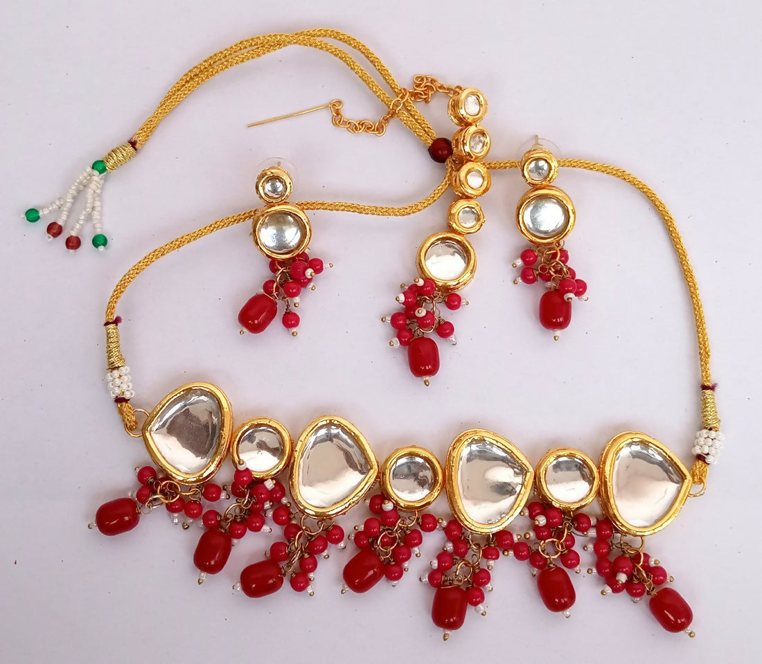 Red Kundan work necklace set with gold-plated accents
