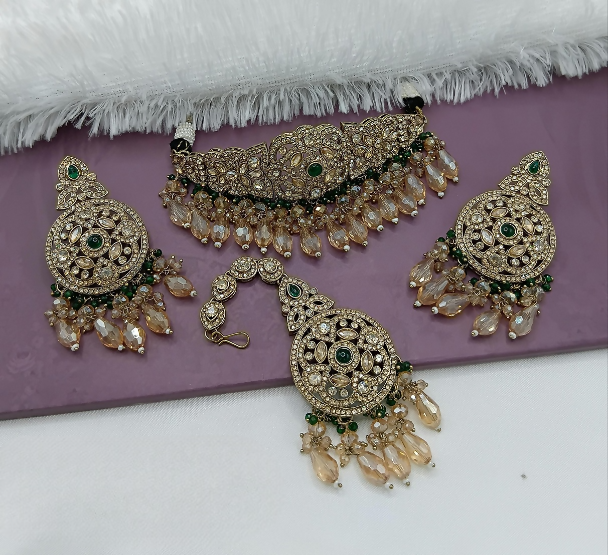 Green alloy choker necklace set with intricate decorative details