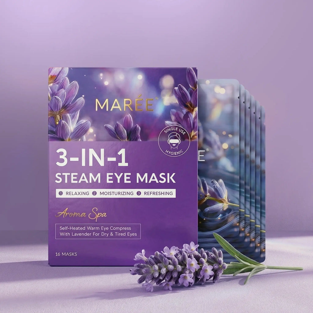 A box of Maree 3-in-1 steam eye masks with lavender imagery, featuring individual foil packets and a sprig of fresh lavender flowers.